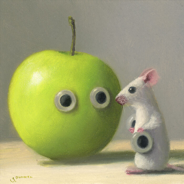 Illustration of a mouse that has just placed two plastic google eyes on a green apple